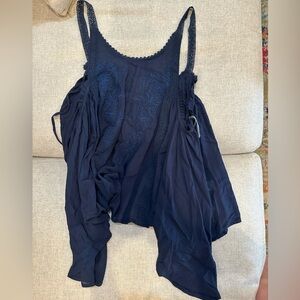 Super cute navy flowy top. Size small in excellent condition. Only worn once.